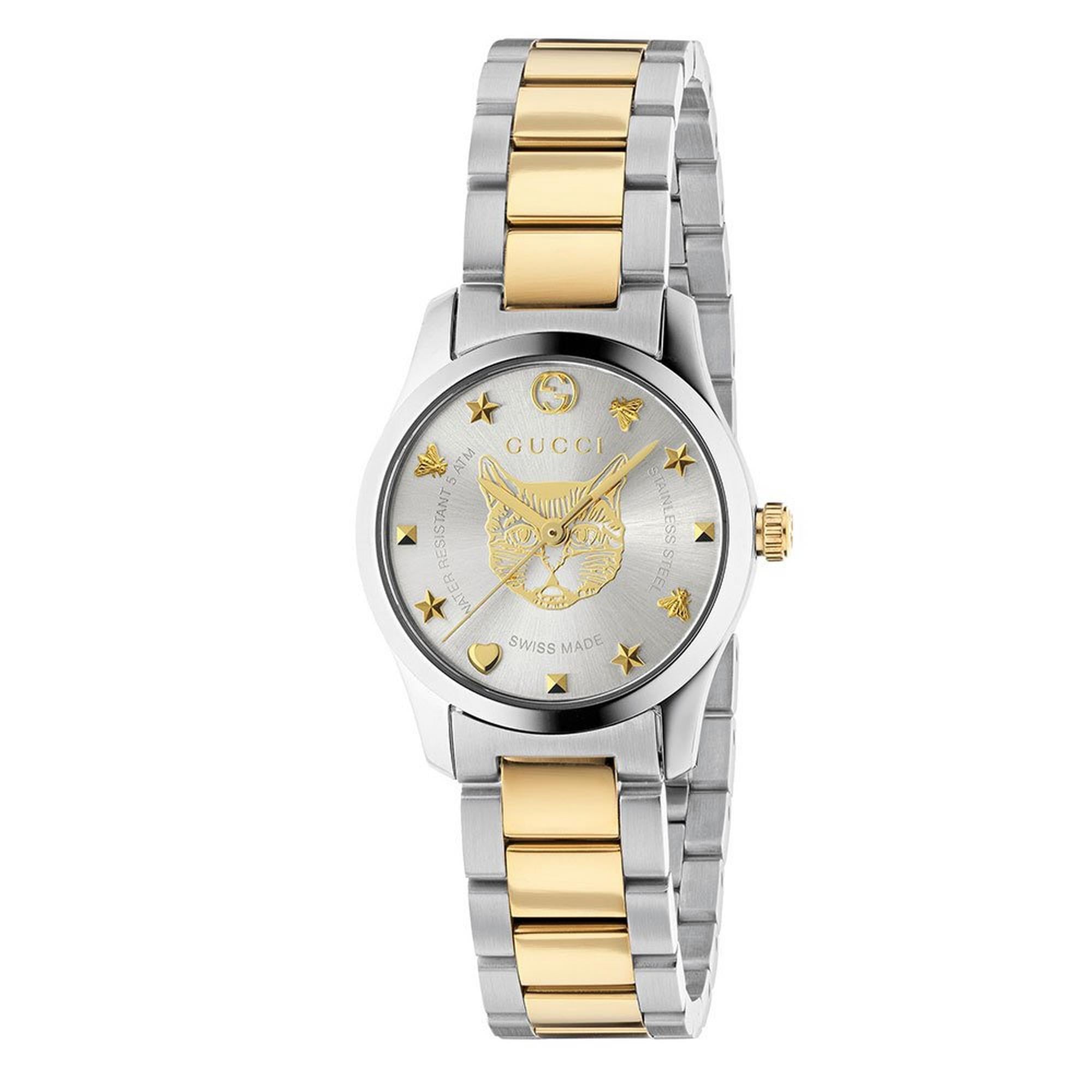 Elegant Gucci G-Timeless Mystic Cat women's watch with a mix of stainless steel and gold-toned PVD case, featuring a silvered dial with gold-toned cat and star motifs.